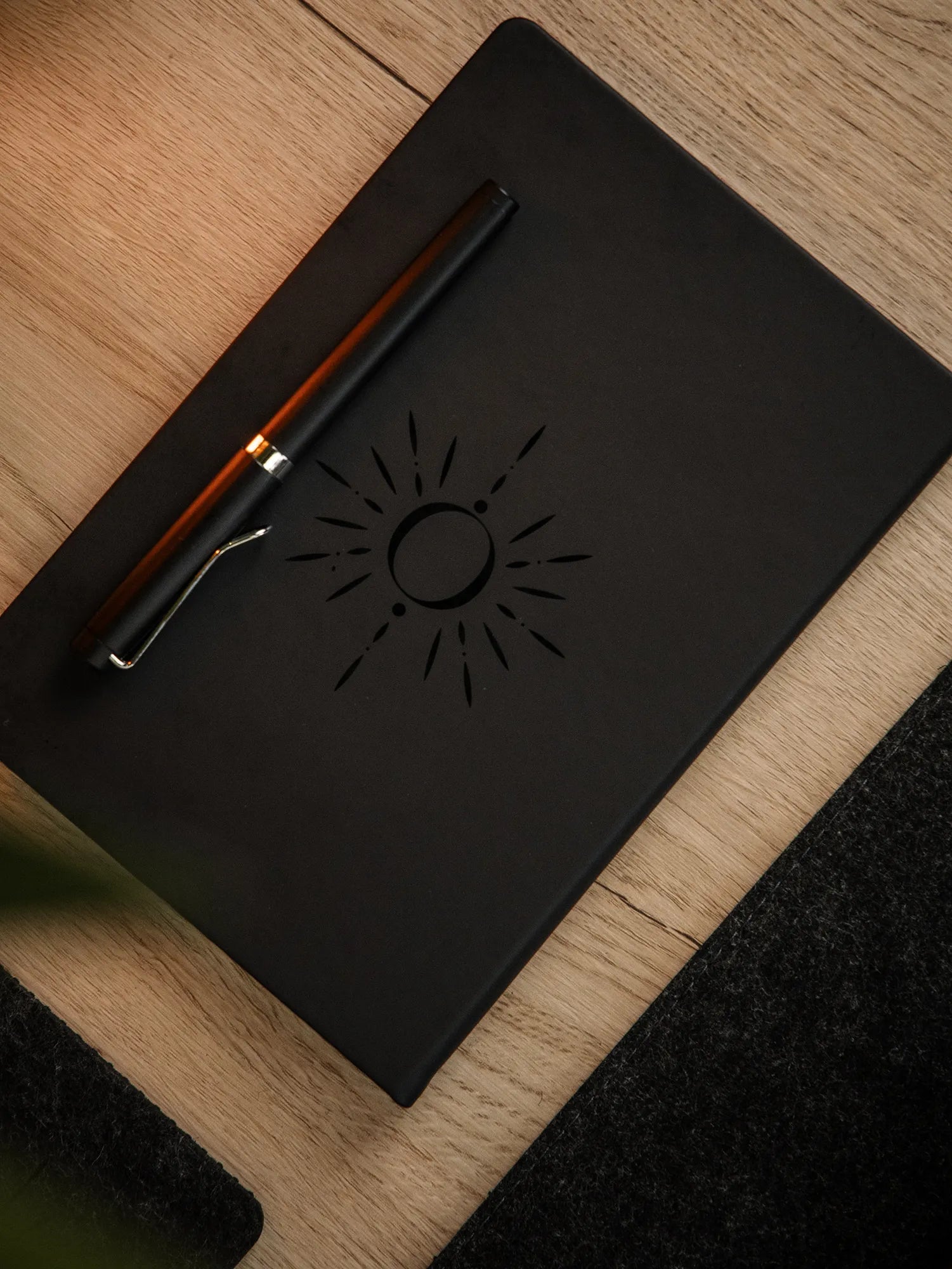 Ortus black paper notebook with the silver pen
