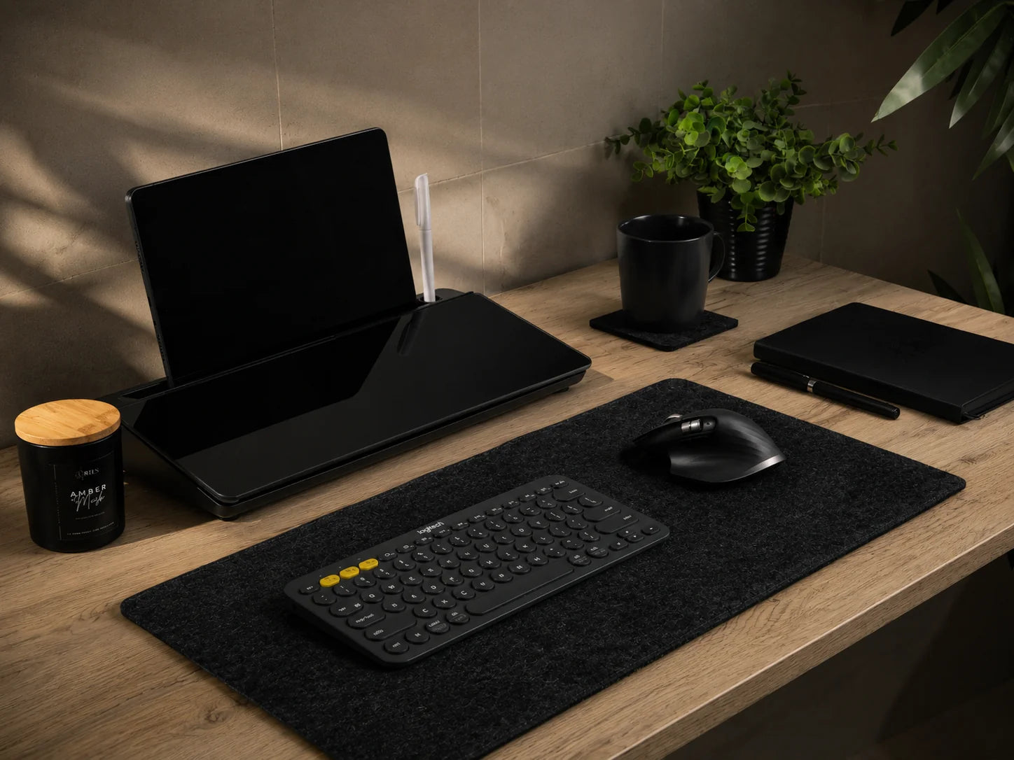 Ortus minimal black desk essentials on a desk
