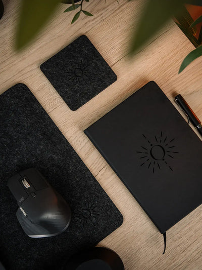 ORTUS Felt Coasters on a desk